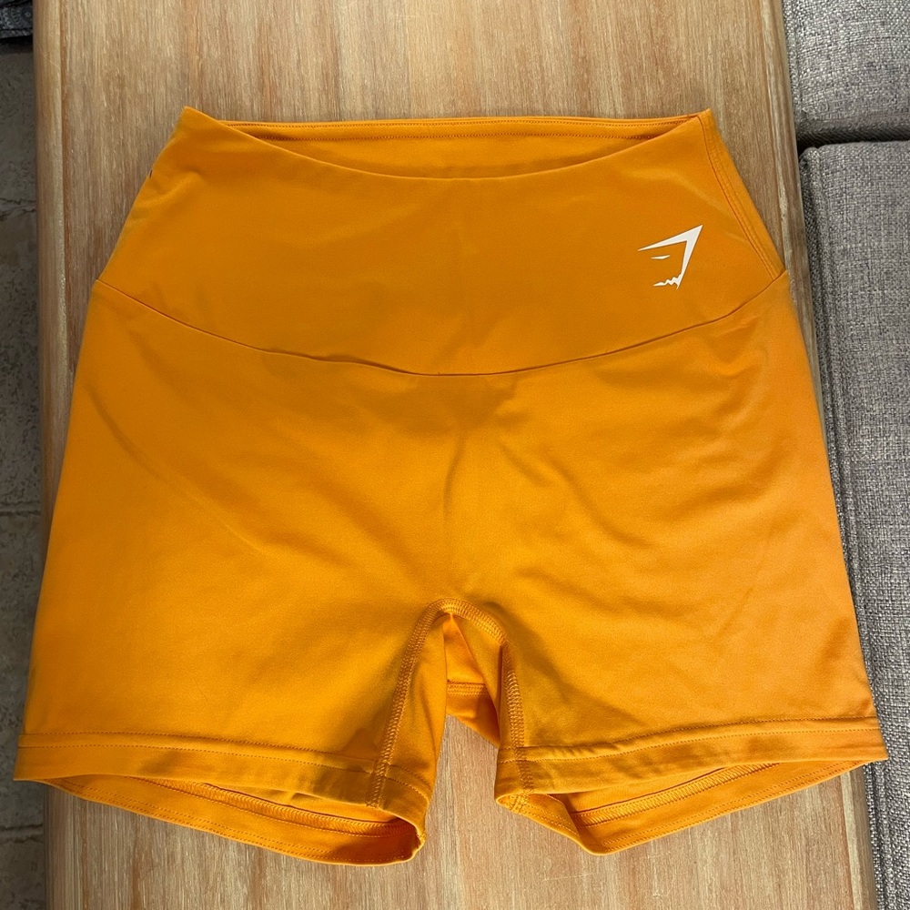 Orange gym shark biker shorts